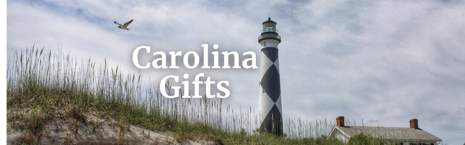 Lighthouse on a cloudy day with 'Carolina Gifts' text overlay.