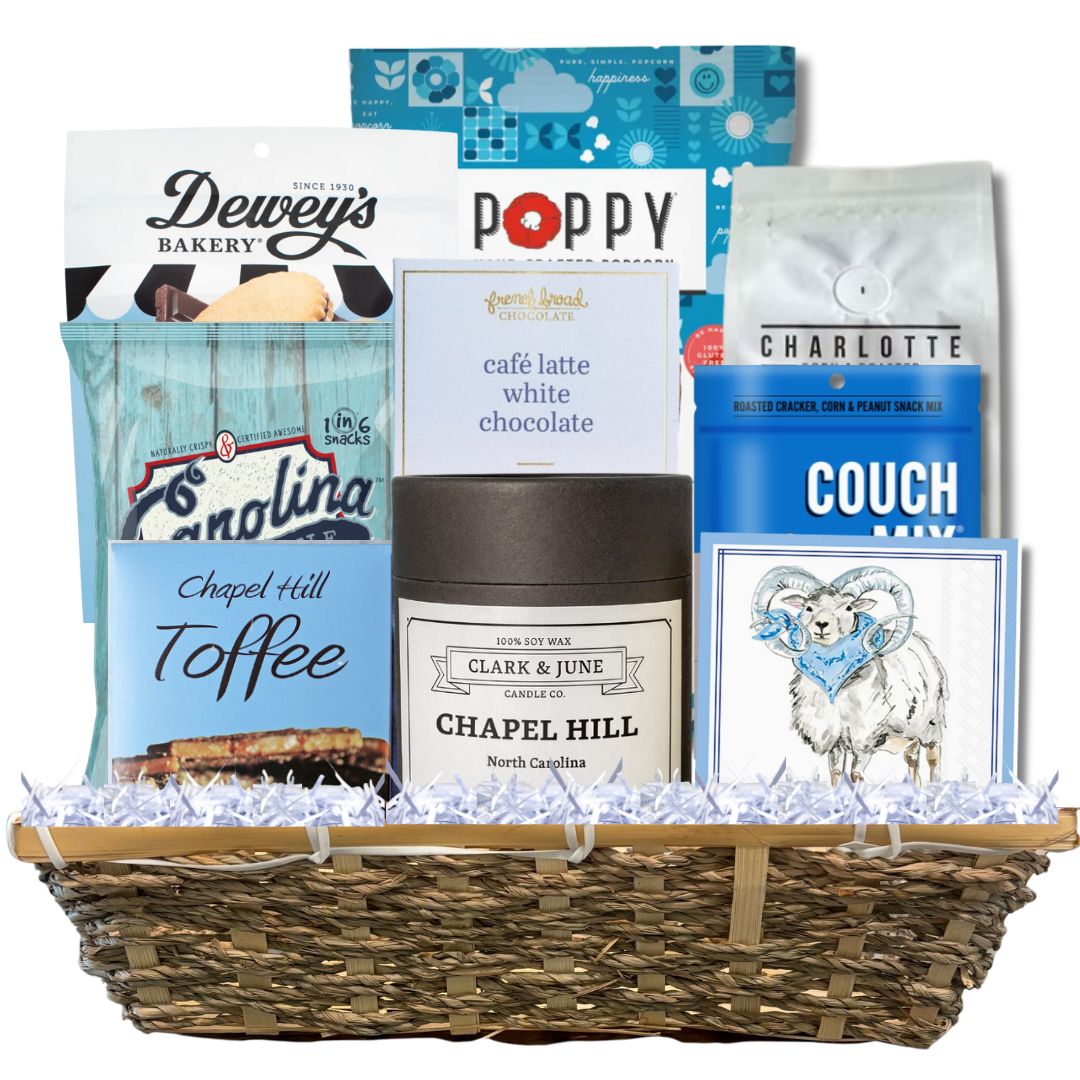 Carolina Blue Deluxe Gift Basket filled with UNC-branded items and premium North Carolina-made treats, perfect for celebrating Tar Heel pride and local flavors.