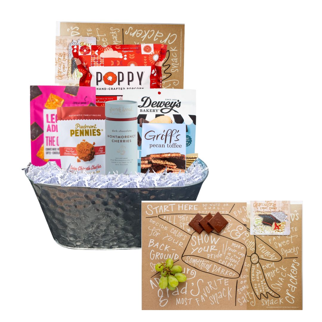 Graduation Charcuterie Gift Basket featuring NC-made gourmet snacks, a reusable charcuterie guide, and a hammered tin planter, perfect for celebrating Tar Heel grads.