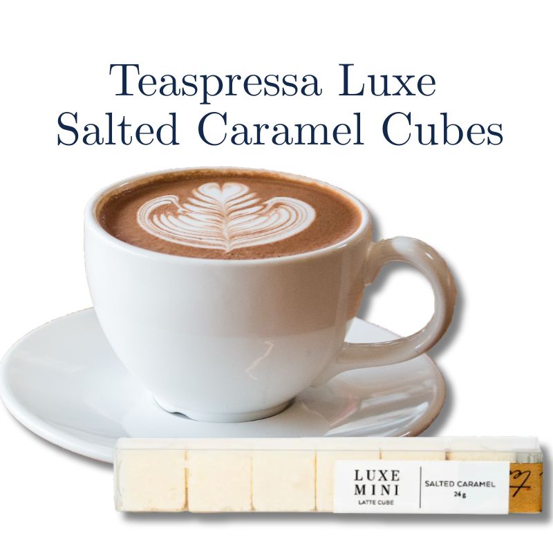 Teaspressa Luxe Salted Caramel Cubes with a cup of coffee on a white background