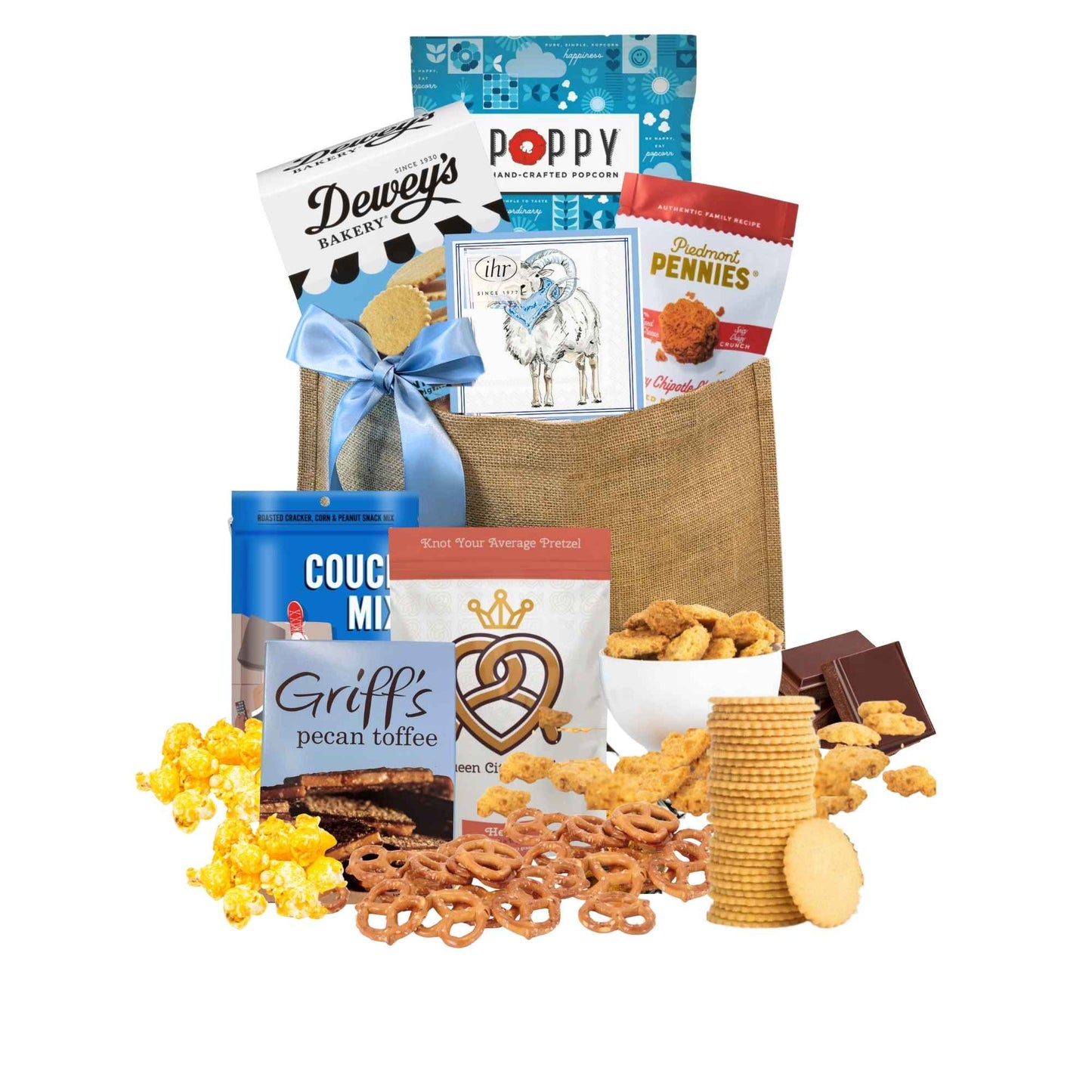 Gift Bag full of locally made in North Carolina products including Dewey's Vanilla Cookies, Carolina BBQ chips, Ellas Parma Amore Popcorn, Ram beverage napkins, Piedmont Pennies, UNC Sour gummies, UNC chocolates