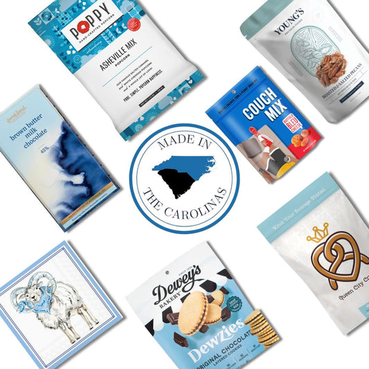 UNC gourmet gift basket contents with Chapel Hill artisan treats and Carolina Blue keepsake candle