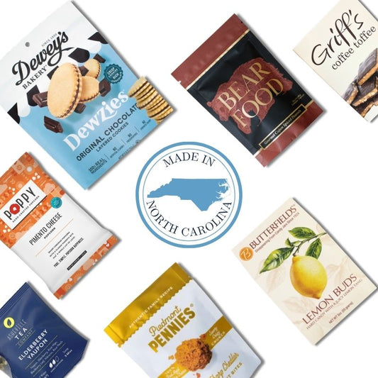 Custom corporate gift tote contents with North Carolina gourmet snacks and branded gift tag