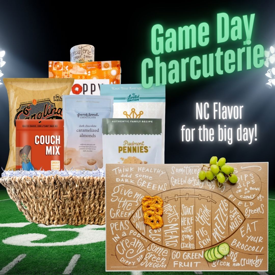 Game day charcuterie board with snacks and a football-themed sign on a sports field background