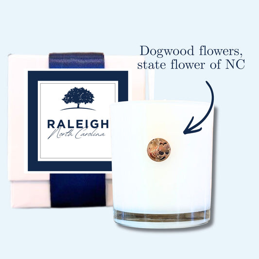Raleigh NC lemon verbena soy candle with gold dogwood emblem and branded box with oak tree label