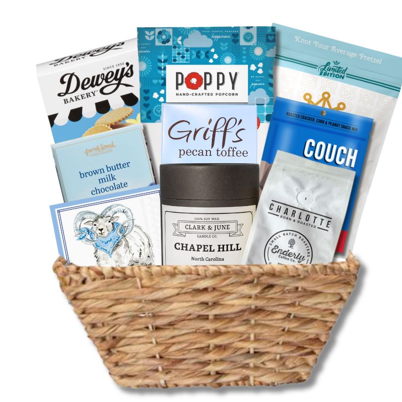 Carolina Blue Deluxe Gift Basket filled with UNC-branded items and premium North Carolina-made treats, perfect for celebrating Tar Heel pride and local flavors.