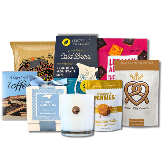 North Carolina welcome gift basket contents with BBQ chips, Chapel Hill Toffee, and artisan tea