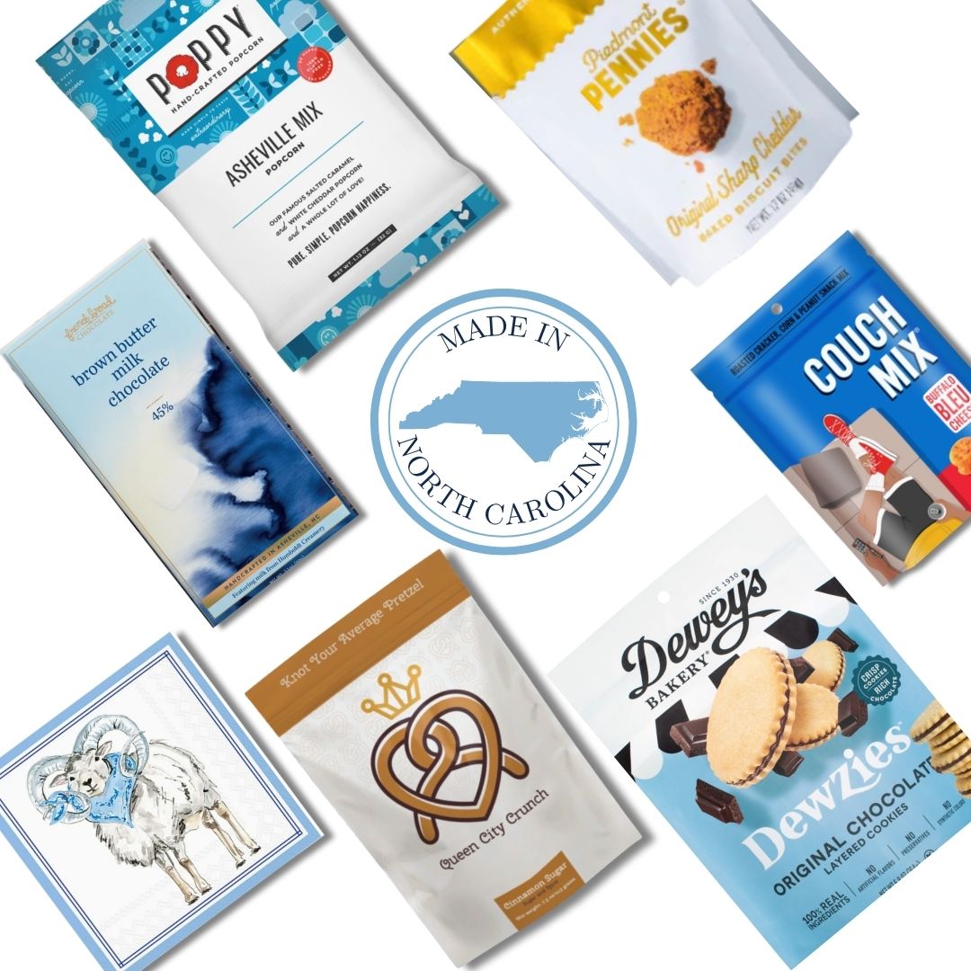 flat lay of North Carolina made products included in a luxury gift basket that is designed for alumni, staff, and fans of UNC North Carolina at Chapel Hill