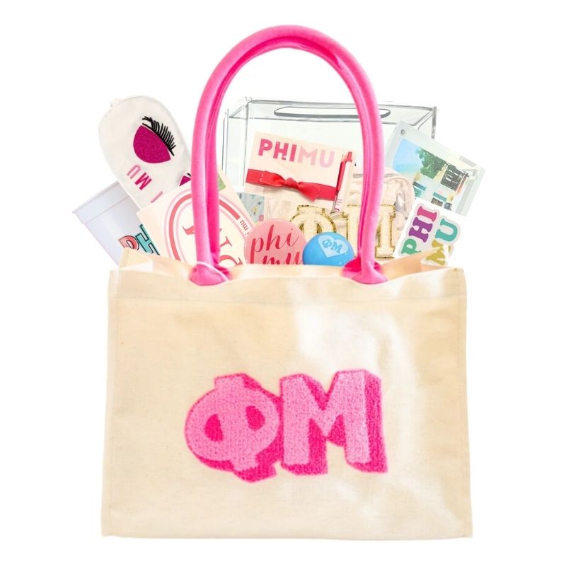 Sorority gift bag filled with sorority-themed items and UNC-branded accessories, perfect for celebrating sorority milestones and showing Carolina pride.