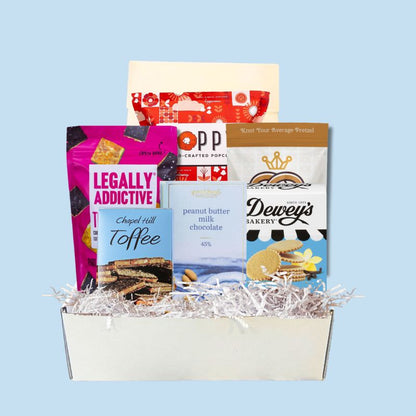Elegant gift box full of locally made North Carolina sweets and desserts for an indulgence