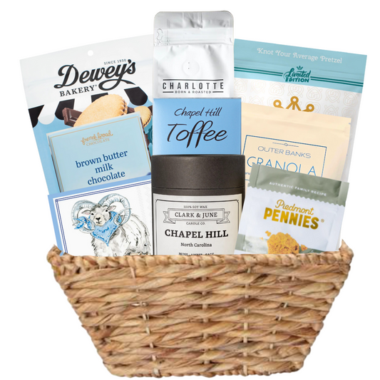 Carolina Blue Deluxe Gift Basket filled with UNC-branded items and premium North Carolina-made treats, perfect for celebrating Tar Heel pride and local flavors.