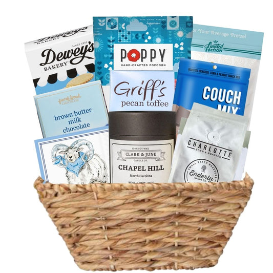 Carolina Blue Deluxe Gift Basket filled with UNC-branded items and premium North Carolina-made treats, perfect for celebrating Tar Heel pride and local flavors.