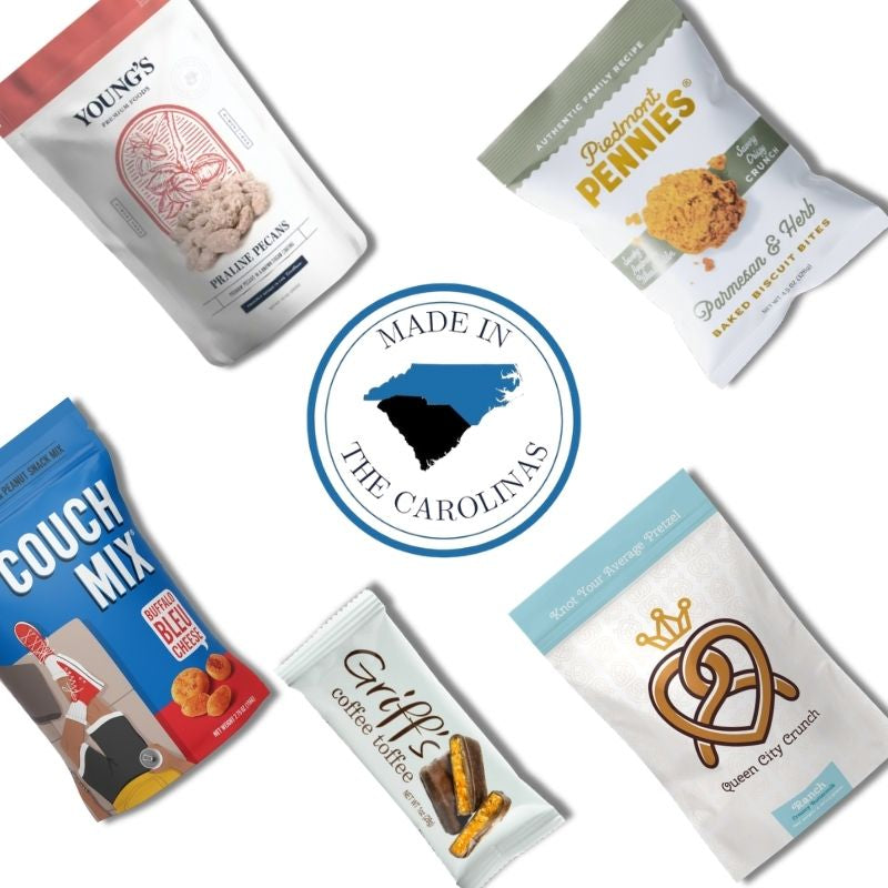 Gourmet items that are made in North and South Carolina in a flat lay around an emblem of the Carolinas