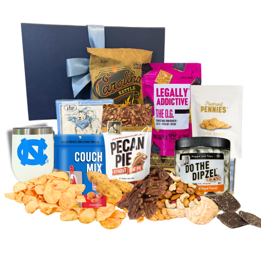 Gourmet UNC Chapel Hill gift containing UNC tumbler, ramses beverage napkins, Chapel Hill chocolate, and other gourmet food made in North Carolina