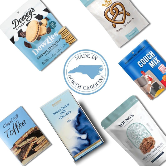 UNC gourmet gift basket contents with Chapel Hill artisan treats and Carolina Blue keepsake candle