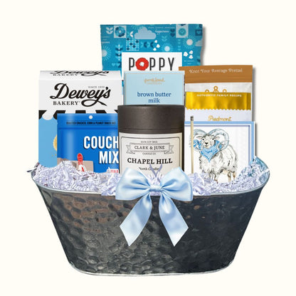 Carolina Blue Deluxe Gift Basket filled with UNC-branded items and premium North Carolina-made treats, perfect for celebrating Tar Heel pride and local flavors.