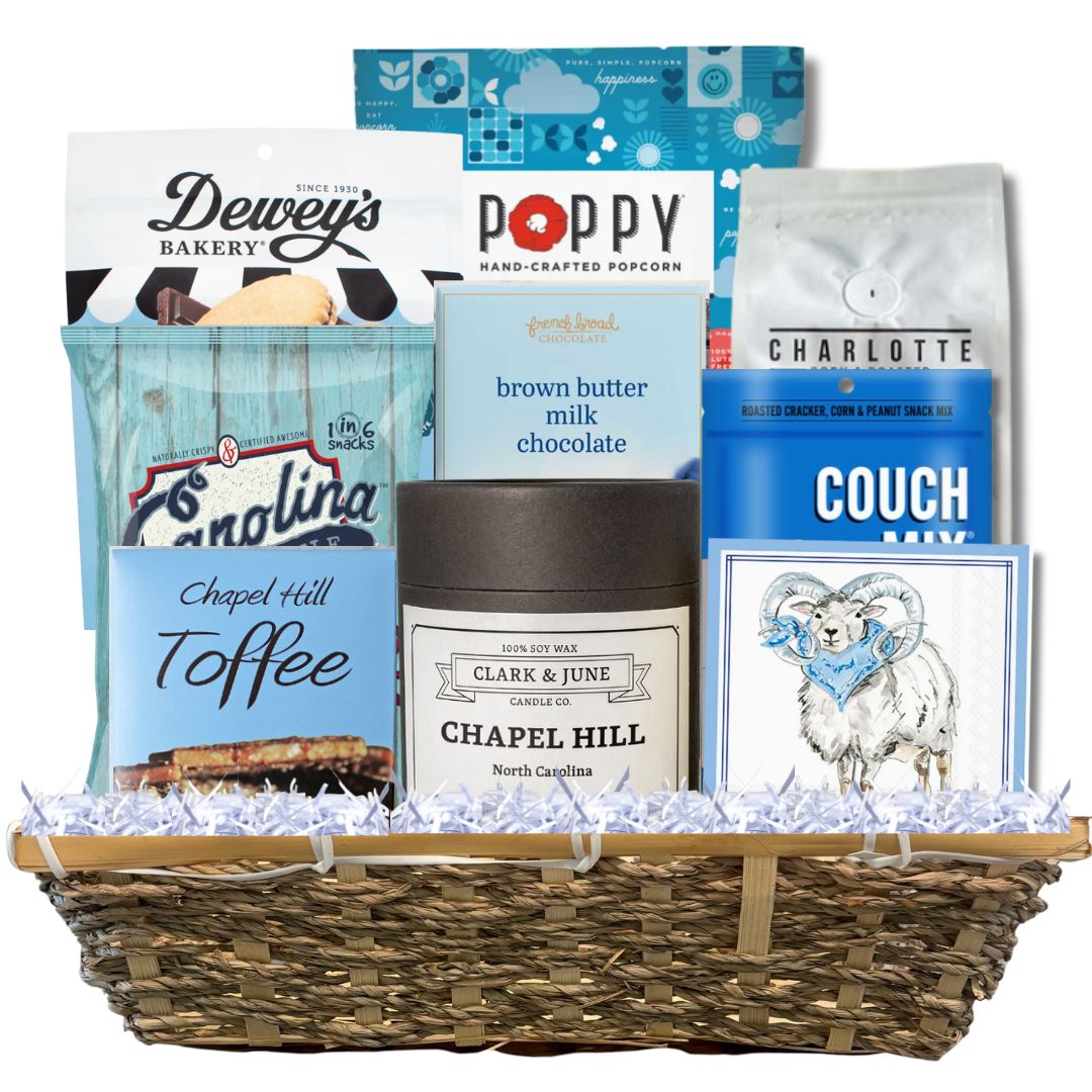 Carolina Blue Deluxe Gift Basket filled with UNC-branded items and premium North Carolina-made treats, perfect for celebrating Tar Heel pride and local flavors.