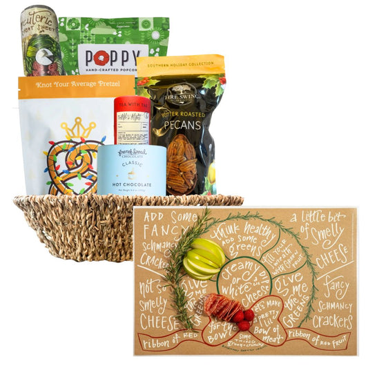 Gourmet gift basket with various items including popcorn, chocolate, and nuts on a white background.