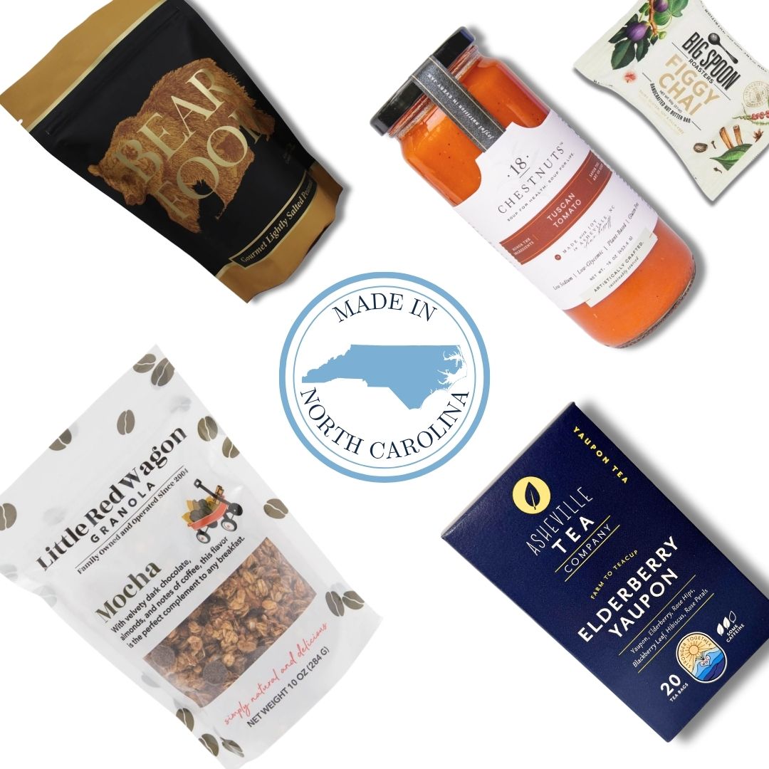 North Carolina wellness gift basket contents with dark chocolate, nut butter bar, and artisan granola