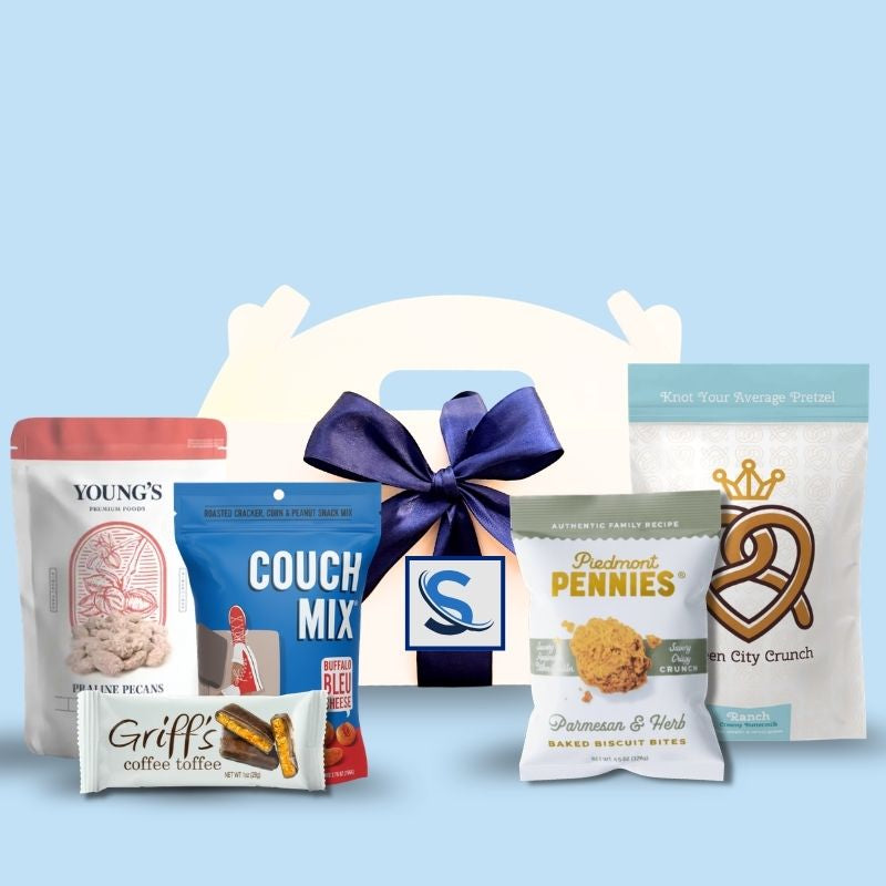 Custom logo branded NC corporate event welcome box with company label and blue ribbon
