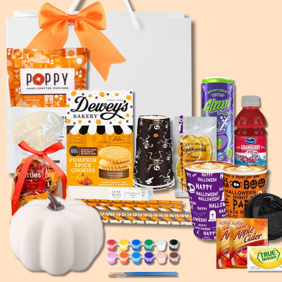 UNC fall-themed party gift bag with contents displayed, including mini pumpkin painting kit, Halloween cups and straws, Alani Witch’s Brew energy drink, apple cider packets, Teaspressa caramel sugar cubes, snacks like Dewey’s pumpkin cookies and Poppy popcorn, and assorted Halloween candy, designed for UNC students.