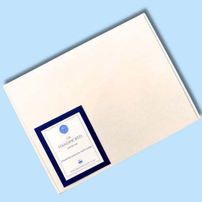 Overhead view of the closed Carolina Sampler gourmet shipping box with a Handpicked Gifts label