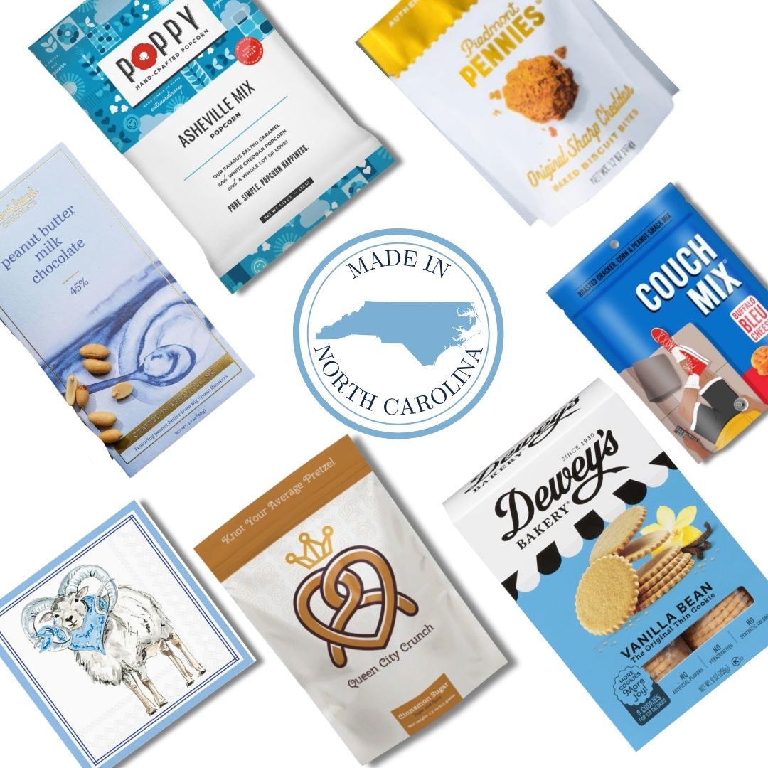 flat lay of North Carolina made products included in a luxury gift basket that is designed for alumni, staff, and fans of UNC North Carolina at Chapel Hill