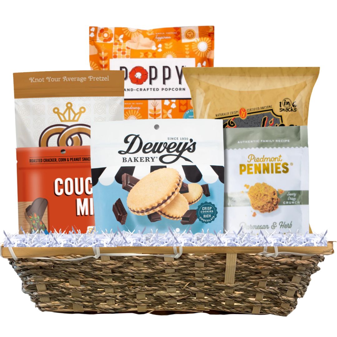 Large woven basket full of locally made NC gourmet snacks including savory and sweet options for Tar Heels 