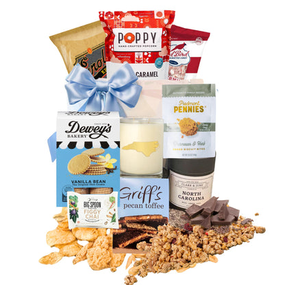 local north carolina food products displayed with gift bag and blue satin ribbon