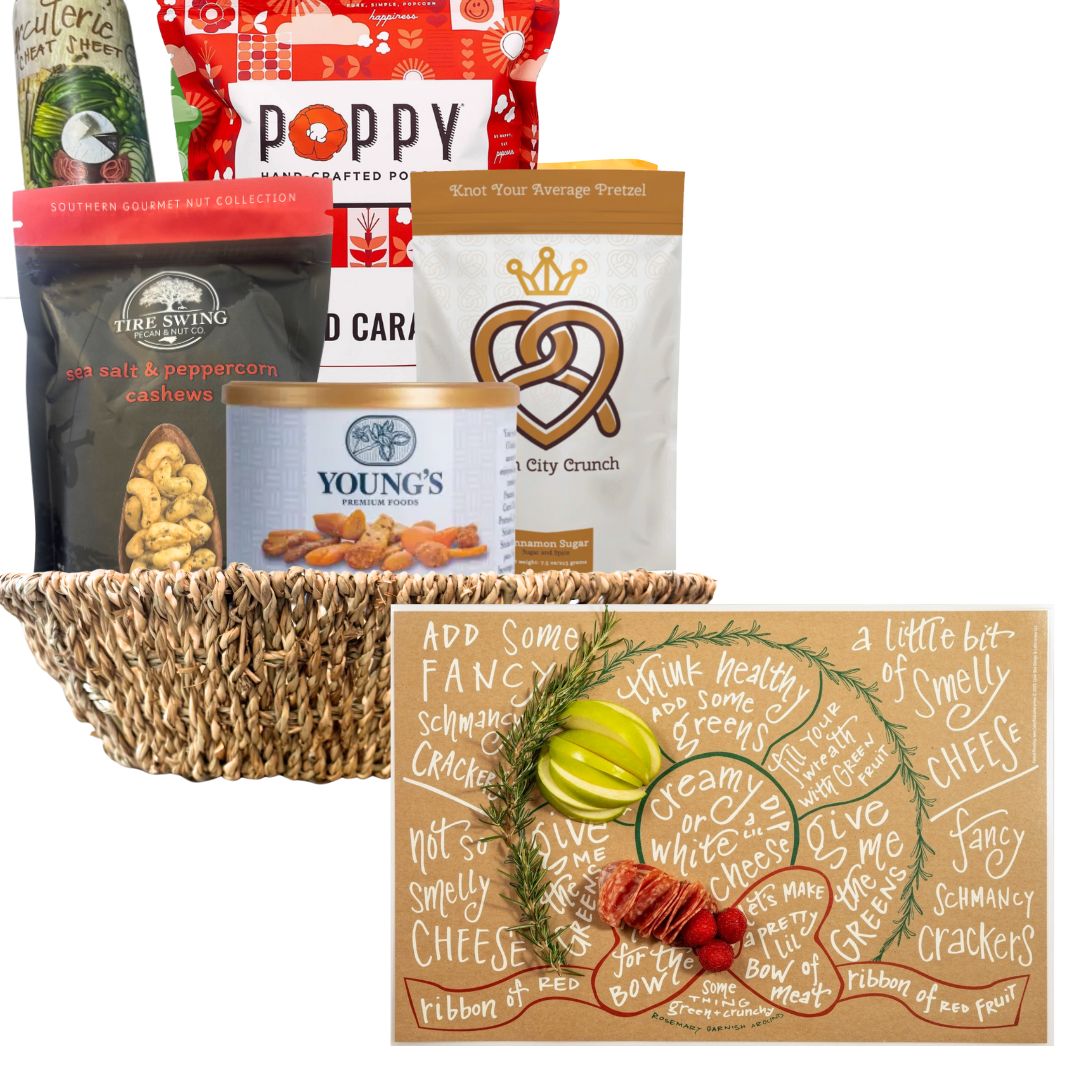 Gourmet gift basket with various items including popcorn, pretzels, and nuts on a white background.
