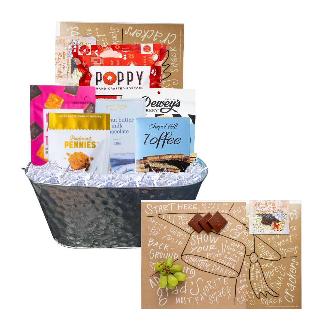 Graduation Charcuterie Gift Basket featuring NC-made gourmet snacks, a reusable charcuterie guide, and a hammered tin planter, perfect for celebrating Tar Heel grads.