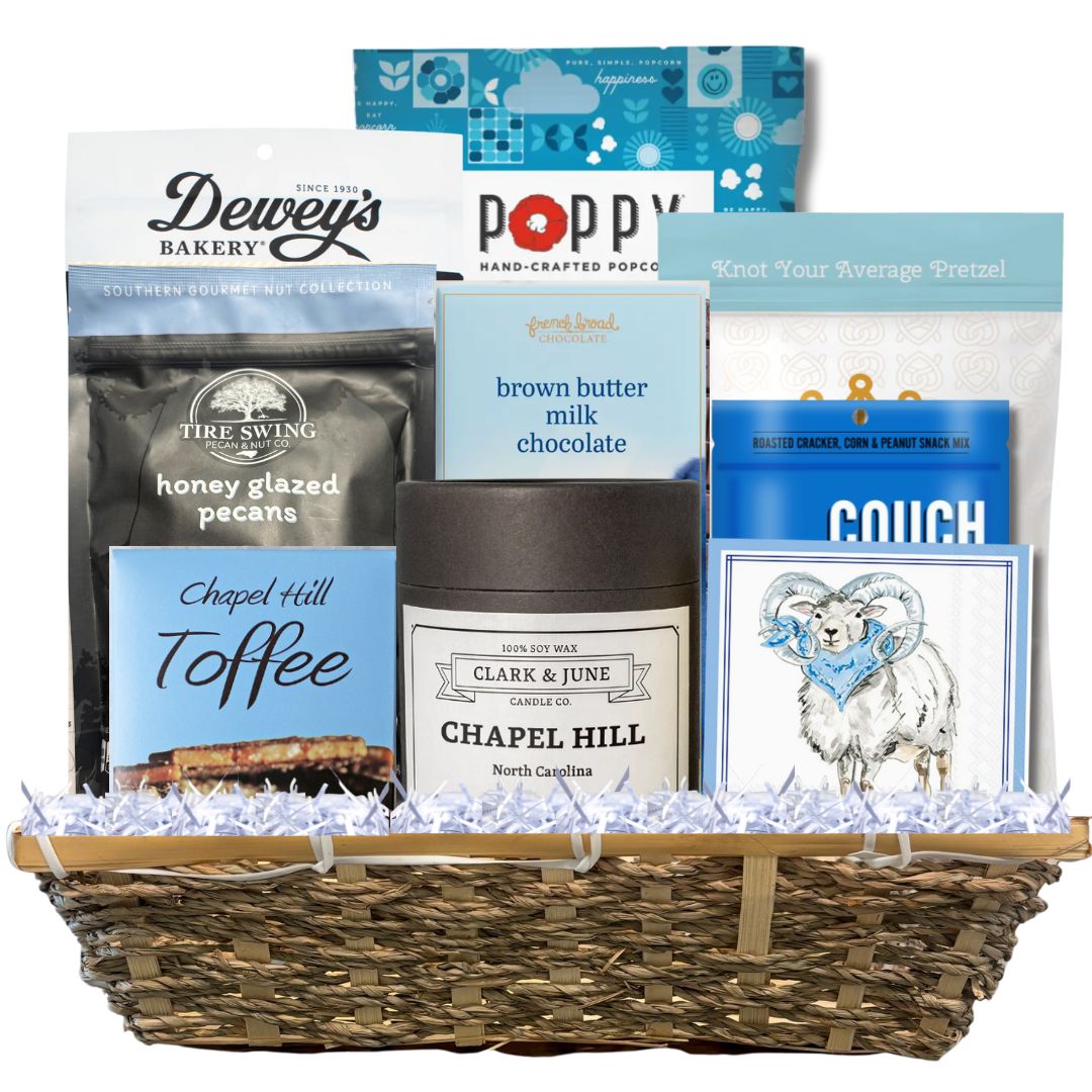 Carolina Blue Deluxe Gift Basket filled with UNC-branded items and premium North Carolina-made treats, perfect for celebrating Tar Heel pride and local flavors.