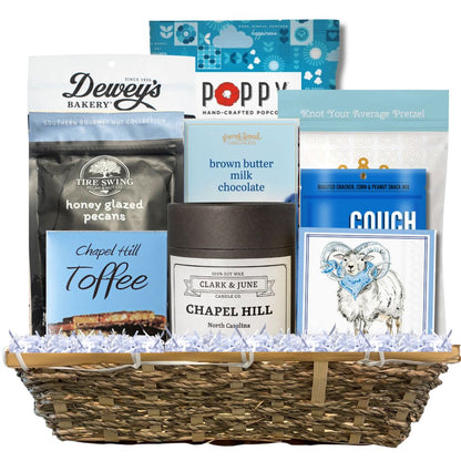 Carolina Blue Deluxe Gift Basket filled with UNC-branded items and premium North Carolina-made treats, perfect for celebrating Tar Heel pride and local flavors.