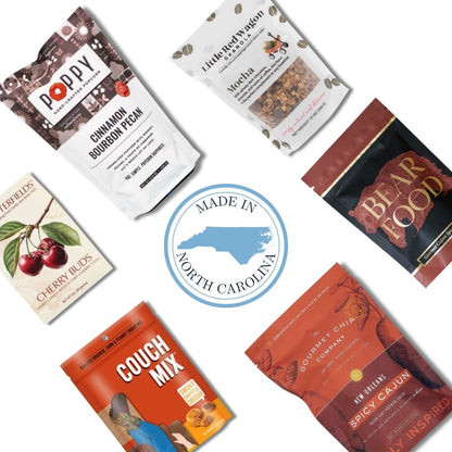 Premium gift basket with NC State wolfpack napkins and red gourmet NC foods