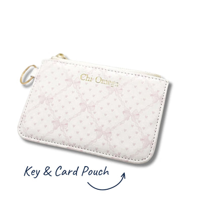 White key and card pouch with sorority branding on a white background