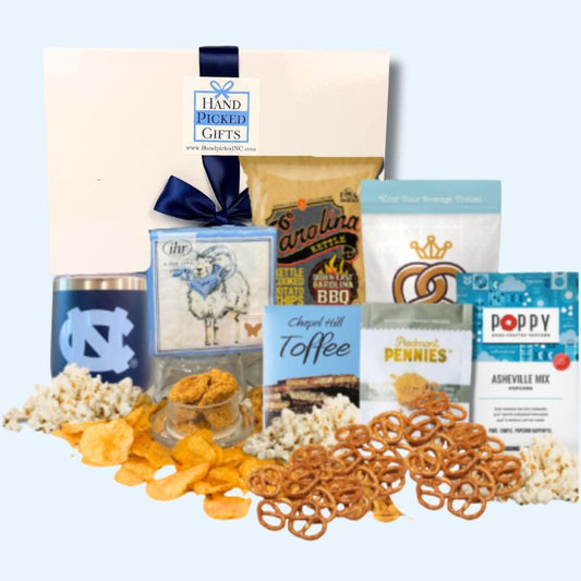 UNC Tar Heels game day gift basket with Chapel Hill tumbler, snacks, and Carolina Blue accessories