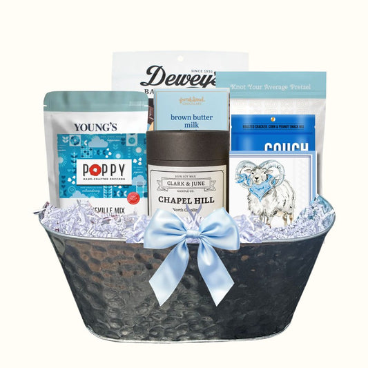 UNC Carolina Blue gift basket with North Carolina artisan treats and keepsake candle for Tar Heel fans