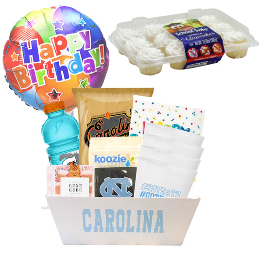 Nut-Free Tar Heel Birthday Surprise basket featuring 12 mini cupcakes, teaspressa cubes, UNC-themed treats, and festive birthday accessories
