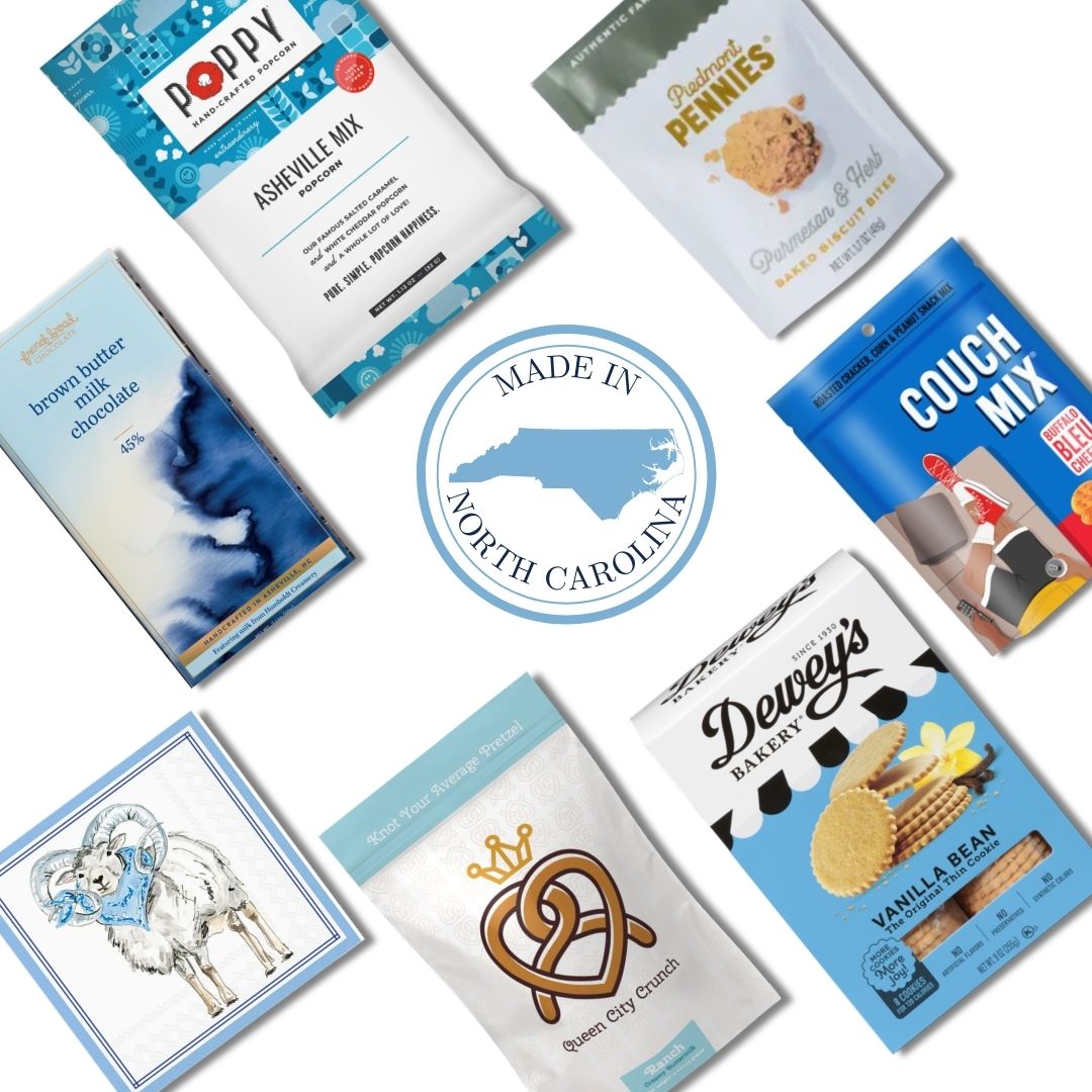 flat lay of North Carolina made products included in a luxury gift basket that is designed for alumni, staff, and fans of UNC North Carolina at Chapel Hill