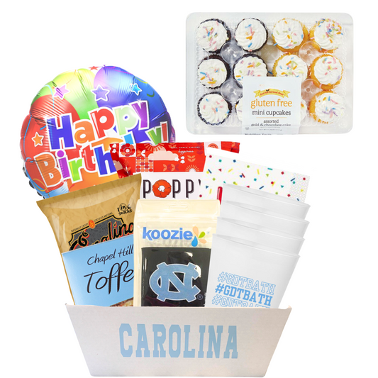Carolina gift basket full of gliten free treats and UNC Chapel HIll branded merchandise for a student's birthday who is gluten free