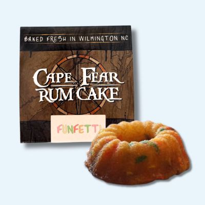 Cape Fear Rum Cake Funfetti birthday cake shown boxed and open beside the packaging, included in North Carolina specialty gift box


