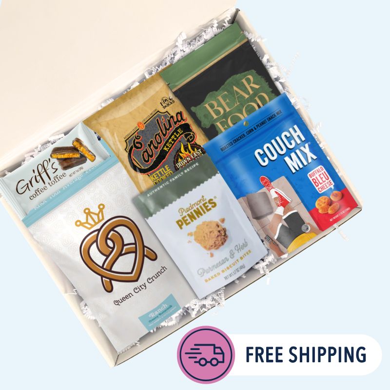  Overhead view of Carolina Sampler gift box open with BBQ chips, toffee, pecans, and pretzels arranged inside