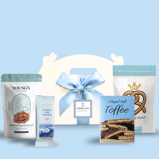 Chapel Hill NC artisan corporate event welcome box with Old Well label and light blue ribbon