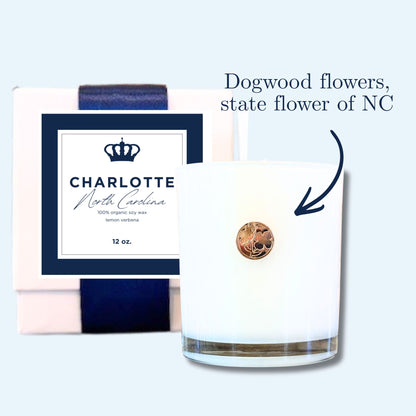 Charlotte NC lemon verbena soy candle with gold dogwood emblem and branded box with Queen City crown label