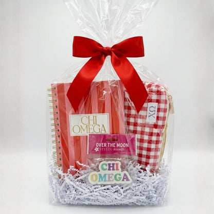 Chi O gift bundle with notebook, makeup bag, and magnet for Bid Day, Initiation, Big/Lil Celebrations.