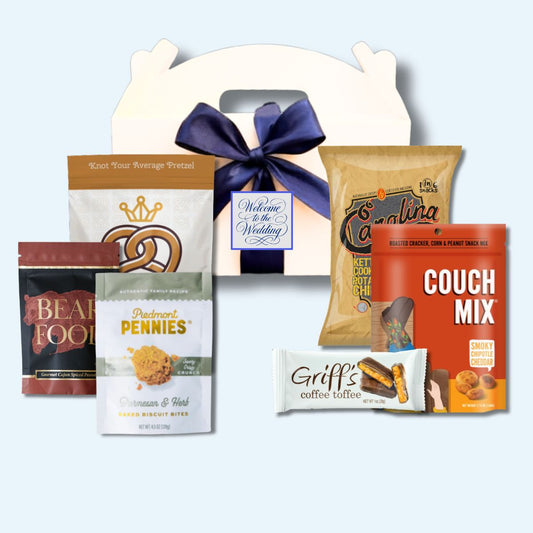 Custom monogram Carolina specialty goods wedding welcome box with personalized label and blue ribbon