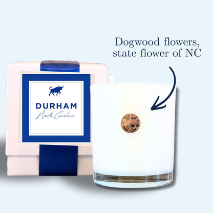Durham NC lemon verbena soy candle with gold dogwood emblem and branded box with bull silhouette label