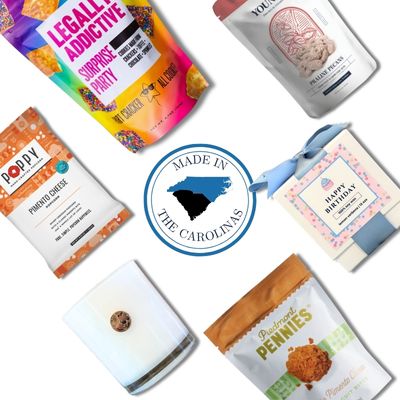 Birthday gift basket contents with North Carolina gourmet snacks and celebration candle