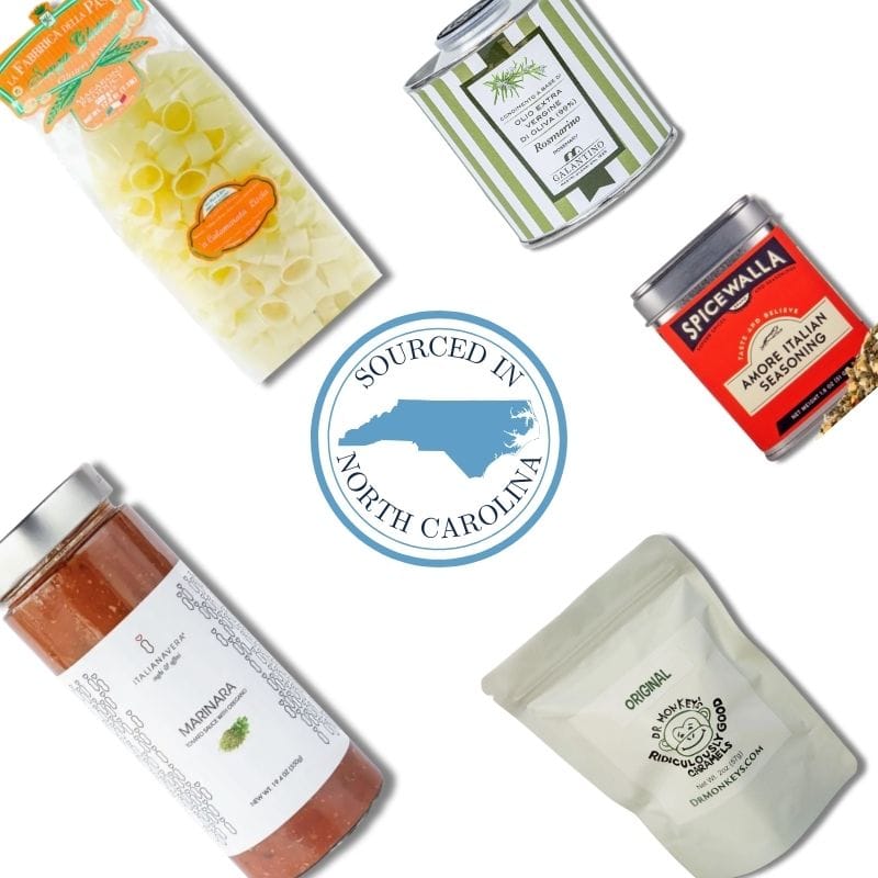 Gluten-free gift basket contents with Italian pasta, marinara, and North Carolina gourmet treats