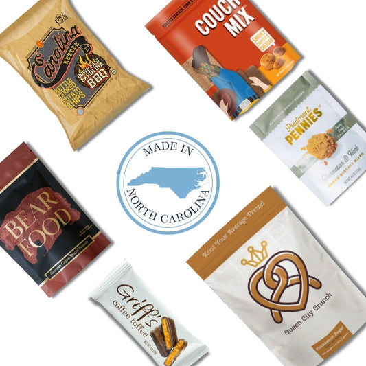 flat lay of north carolina made products in wedding welcome box for guests
